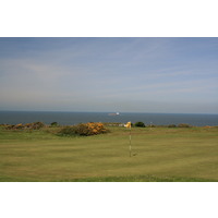 Tankers and massive cargo ships often pass by the golf course at Bull Bay. 