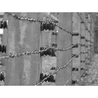Barbed wire encircles the former Nazi concentration camp in Auschwitz, about an hour by train from Krakow Valley.