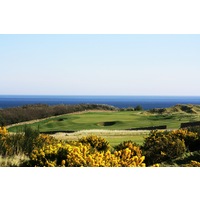 The 16th hole on the Torrance Course at the Fairmont St. Andrews is a long par 3 that is well protected by pot bunkers.