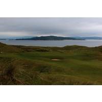 The par-4 sixth hole on the Sandy Hills links at Rosapenna Hotel & Golf Resort climbs uphill, then falls to the green. 