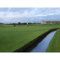 Swilcan Burn guards the green on No. 1 on the Old Course at St. Andrews.