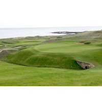 The 18th green closes out a Kingsbarns round in dramatic fashion.