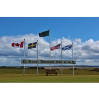 These flags rarely lie down because of the wind near the first tee of the Championship Course at Royal Dornoch Golf Club.