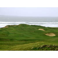 The sea arrives in full force at the sixth green on the Old Course at Lahinch Golf Club.